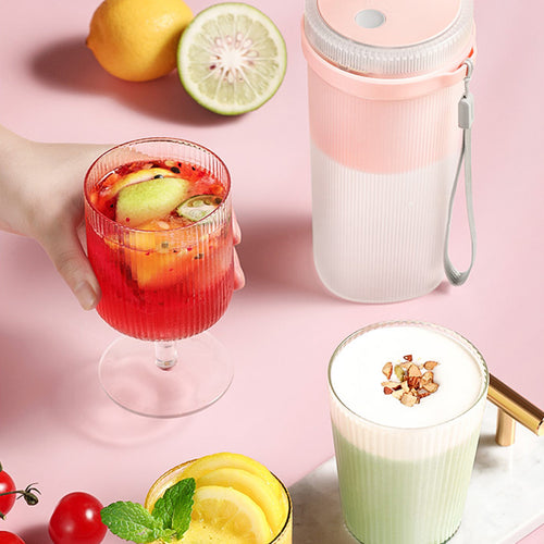 PulseMix GoBottle blending a fruit smoothie on the go